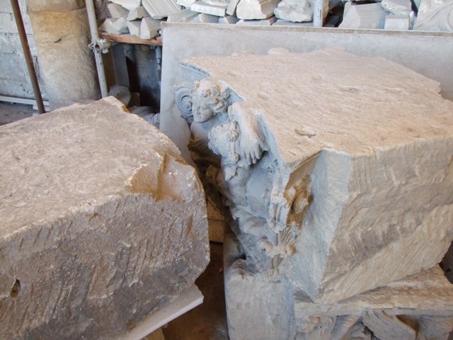 VII.4.57 House of the Figured Capitals.   Figures of a man and woman on a capital.  This faced in to the vestibule on the top of left hand side of entrance.