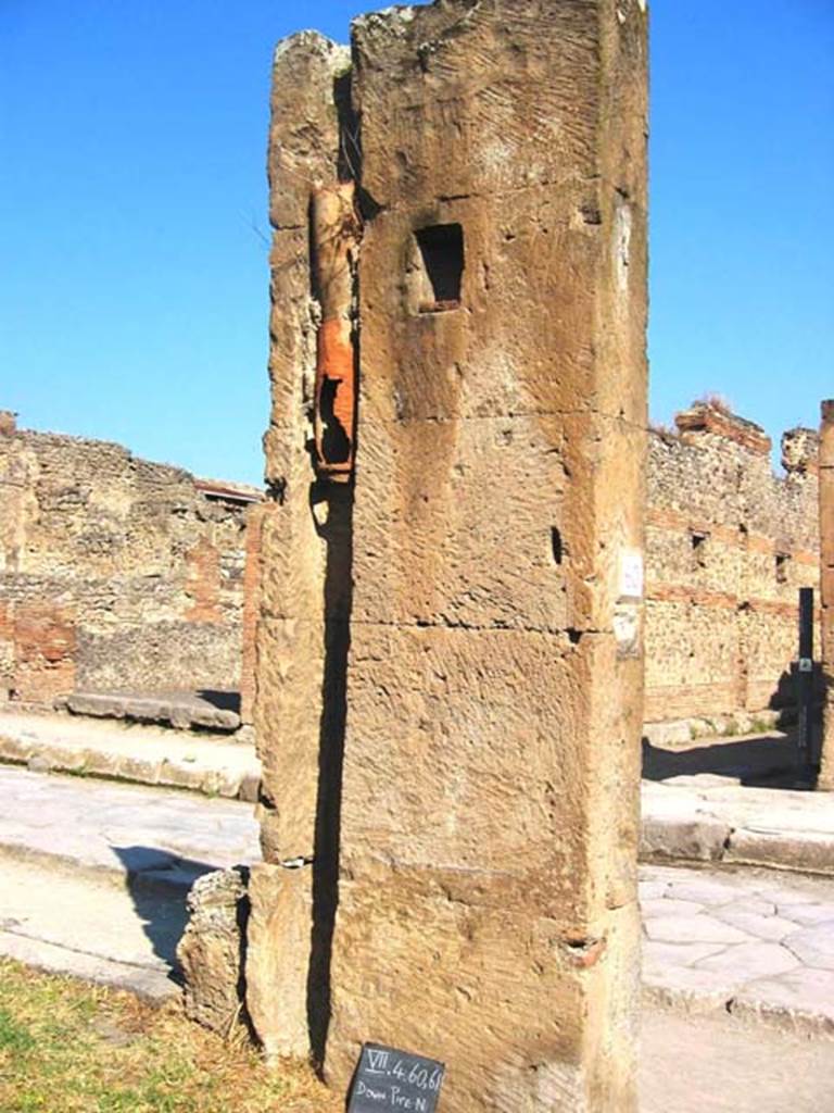 VII.4.60/61 Pompeii. July 2008. Looking north to rear of pilaster with downpipe, between VII.4.60 and VII.4.61. Photo courtesy of Barry Hobson