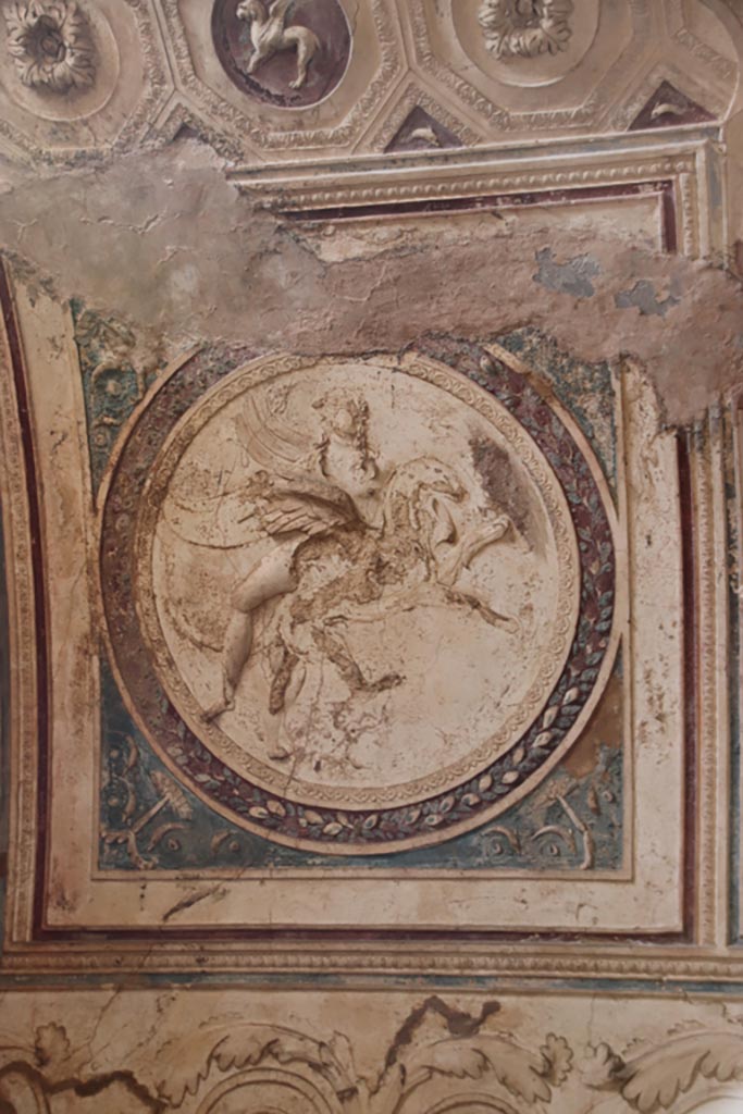 VII.5.24 Pompeii. October 2023.
Detail from ceiling plaster stucco in south-west corner of tepidarium (37). Photo courtesy of Klaus Heese.
