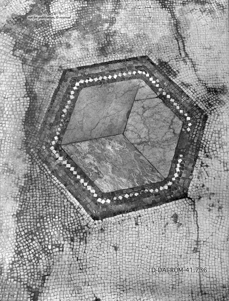 VII.6.7 Pompeii. c.1930.
Cubiculum 40, flooring of white mosaic, with a hexagon in the centre formed by three diamonds of coloured marble, with border of black, white and red bands.
DAIR 41.736. Photo © Deutsches Archäologisches Institut, Abteilung Rom, Arkiv.
See Pernice, E. 1938. Pavimente und Figürliche Mosaiken: Die Hellenistische Kunst in Pompeji, Band VI. Berlin: de Gruyter, (p.89-90, and taf. 41,2 above).