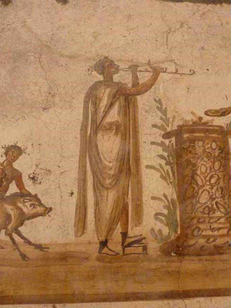 VII.6.38 Pompeii. Detail of the double-flute player or tibicen, shown on lararium painting. Now in Naples Archaeological Museum. Inventory number: 8905.