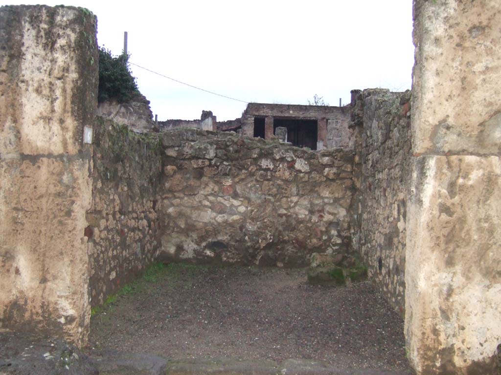 VII.7.6 Pompeii. December 2005. Looking north across shop.