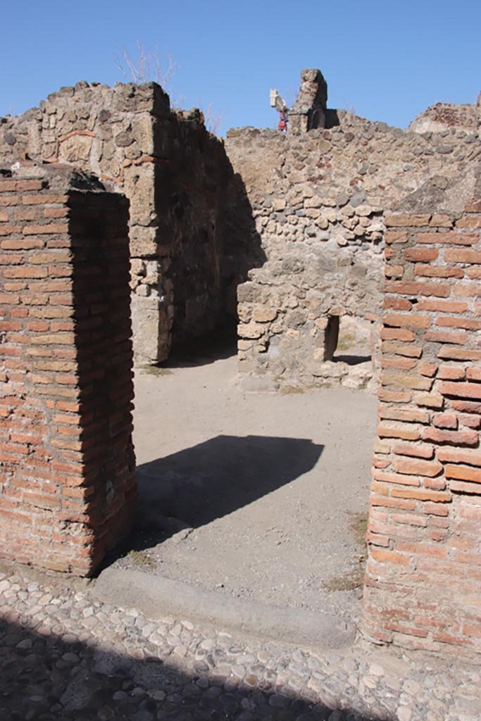 VII.7.8 Pompeii, October 2023.
Looking north to entrance to steps to upper floor. Photo courtesy of Klaus Heese.