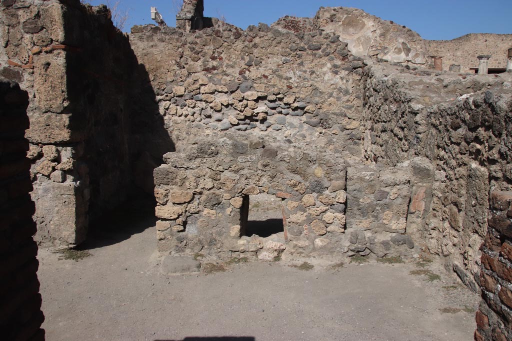 VII.7.9 Pompeii. October 2023.
Looking through doorway of stairs at VII.7.8, into south-east room and rear room of VII.7.9. Photo courtesy of Klaus Heese.