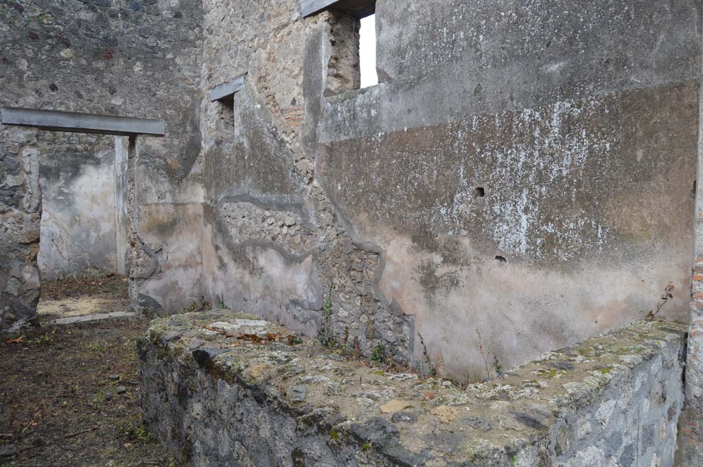 VII.7.18 Pompeii. March 2018. Looking south-west across counter in bar-room, towards west wall with outline of wooden stairs.
Foto Taylor Lauritsen, ERC Grant 681269 DÉCOR.