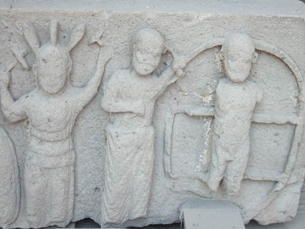 VII.7.29 Pompeii. December 2006. Metope in storage. Detail of the punishment of Ixion on the wheel from VIII.7.31 the Doric Temple.