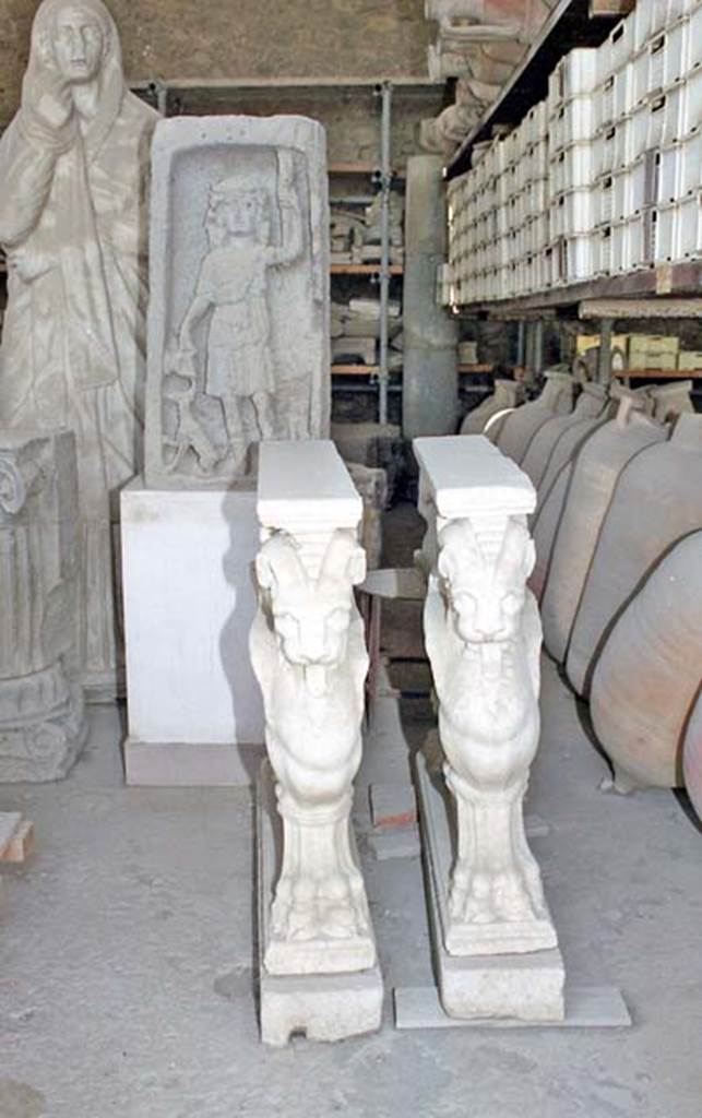 VII.7.29 Pompeii. October 2001. Pair of table supports in storage. Photo courtesy of Peter Woods.