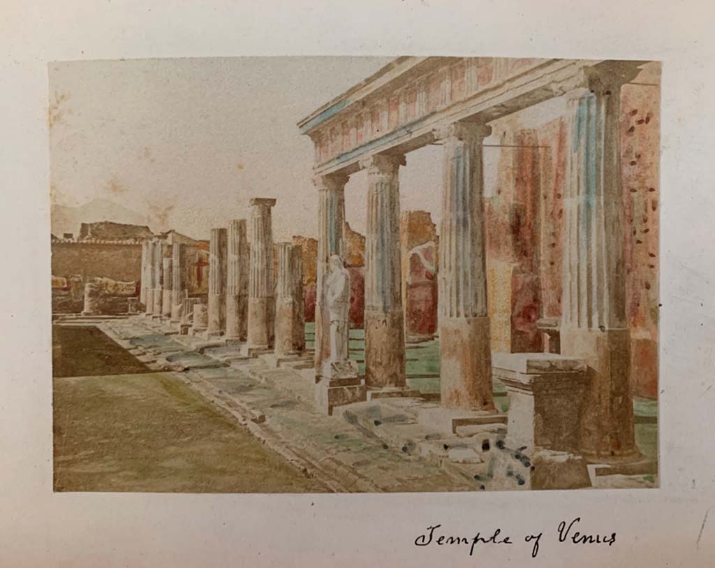 VII.7.32 Pompeii. From a coloured album by M. Amodio, dated c.1880. Looking north along east side of Temple.
Photo courtesy of Rick Bauer.