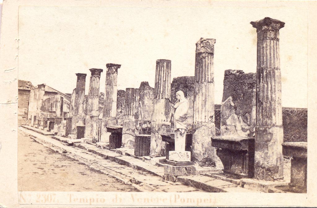 VII.7.32 Pompeii. Between 1867 and 1874. East side of Temple of Apollo.
Note the large heavy lintel pieces are on the floor between the columns, not yet re-erected on the columns.
Photo by Sommer and Behles numbered 2307. Photo courtesy of Charles Marty.