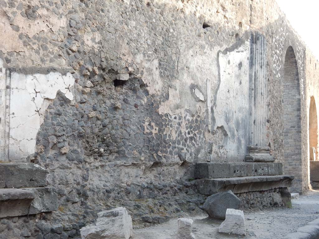 VII.8 Pompeii Forum. June 2019.
Looking west along north wall of Forum in Vicolo dei Soprastanti, towards arch near VII.8.26 and fountain, on right.
Photo courtesy of Buzz Ferebee.
For a description of excavations carried out on the north side of the Temple, and in the north-west corner of the Forum (west side of Temple),
See Notizie degli Scavi, 1942, (p.309-320).