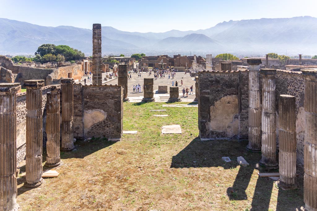 VII.8.1 Pompeii. October 2023. Looking south from rear of Temple, across podium, towards Forum. Photo courtesy of Johannes Eber.