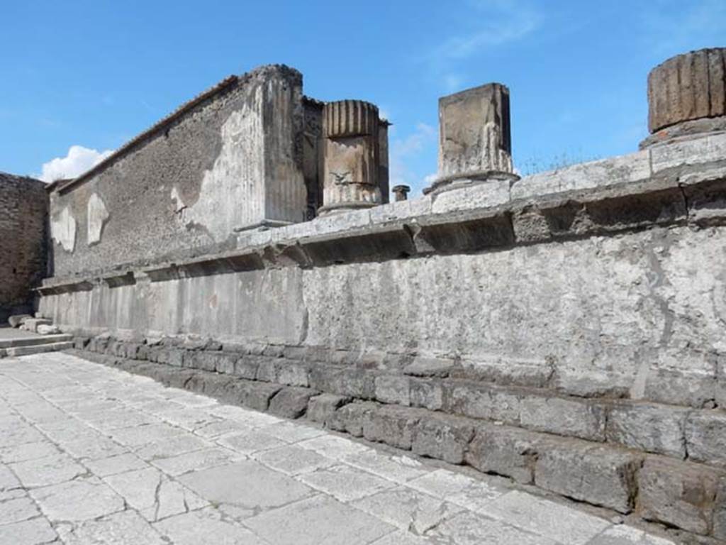 VII.8.1 Pompeii, May 2018. Looking north along west wall of Temple of Jupiter. Photo courtesy of Buzz Ferebee.