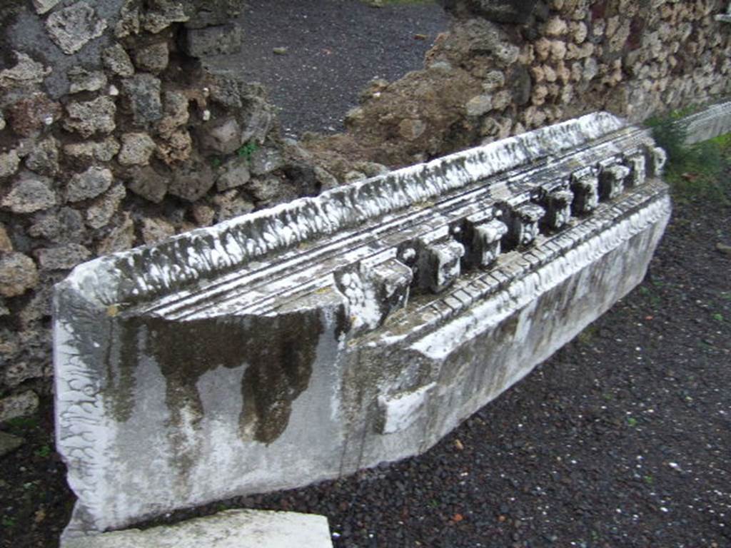 VII.9.1 Pompeii. December 2005. Carved marble on ground.