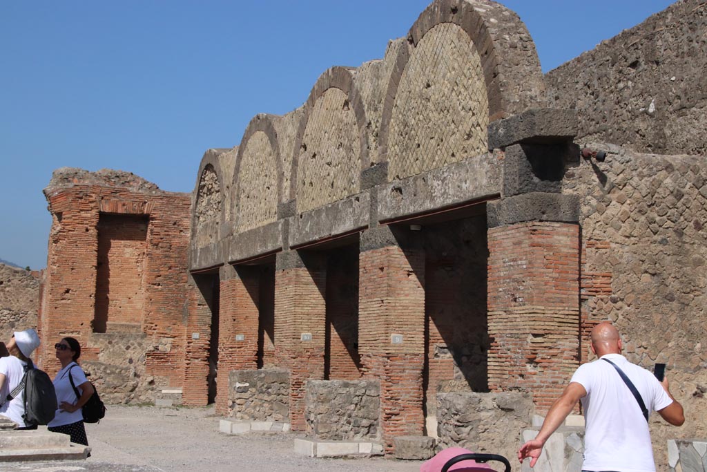 VII.9.9 Pompeii. October 2023.
Looking towards entrances VII.9.12, 11, 10 and 9 in north-east corner of Forum. Photo courtesy of Klaus Heese.