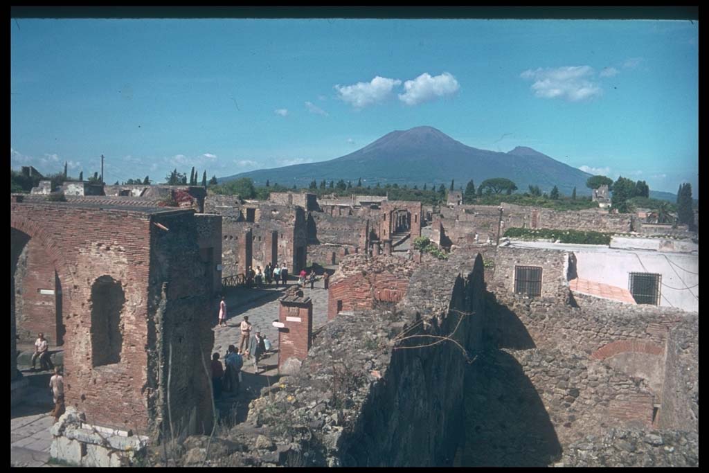VII.9.9 Pompeii. Looking north along Via del Foro towards Vesuvius, from top of scaffolding in shop.
Photographed 1970-79 by Günther Einhorn, picture courtesy of his son Ralf Einhorn.
