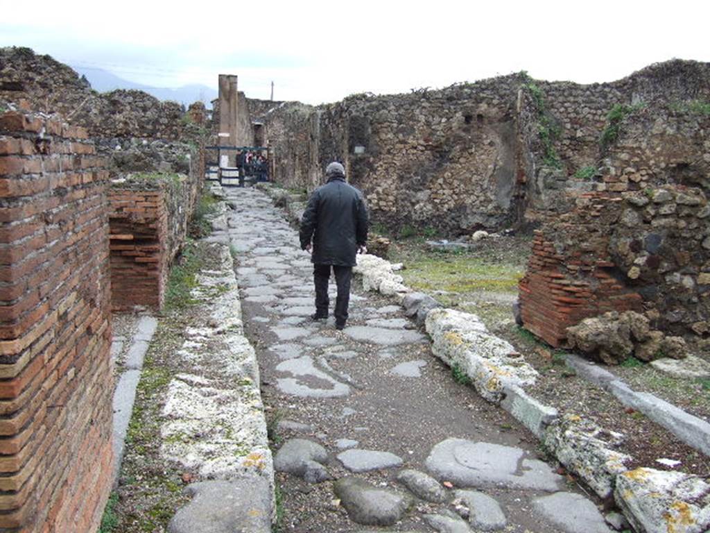 VII.9.36 Pompeii. December 2005. Vico di Eumachia looking north. VII.12