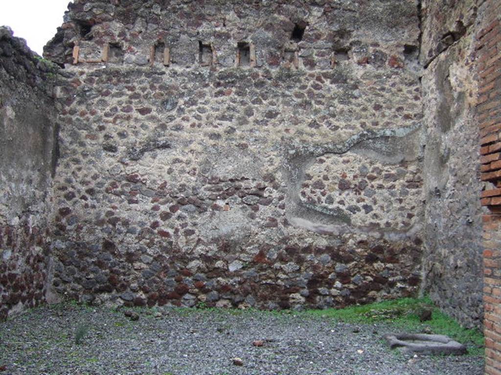 VII.9.59 Pompeii. December 2005. Looking west across shop. According to Eschebach, on the left would have been the counter, but no longer visible.
On the right would have been the steps to the upper floor with a latrine beneath them. The cistern-mouth can also be seen on the right. 
See Eschebach, L., 1993. Geb�udeverzeichnis und Stadtplan der antiken Stadt Pompeji. K�ln: B�hlau. (p.318)
