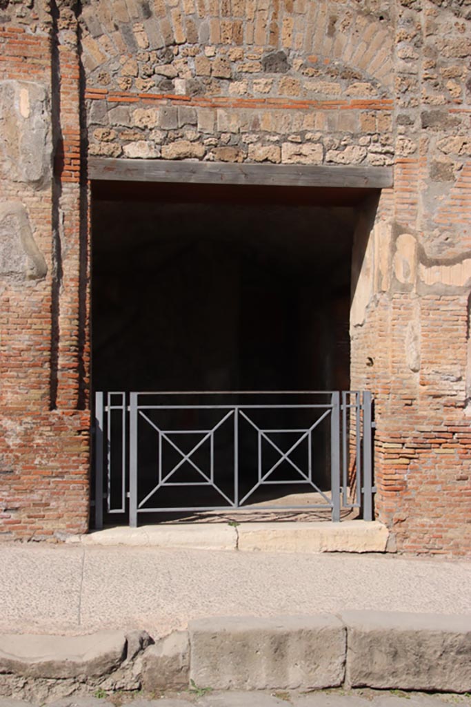 VII.9.68 Pompeii. October 2023.
Looking north to entrance doorway into shop. Photo courtesy of Klaus Heese.