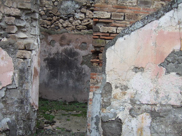 VII.10.3 Pompeii. December 2005. Doorways to room 10 and 11 on south side of atrium.