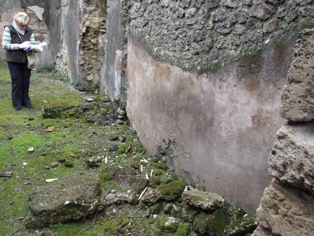 VII.11.14 Pompeii. March 2009. North end of room 1, the passageway, with doorway to room 3, triclinium.
