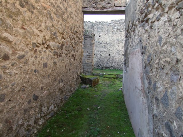 VII.11.14 Pompeii. March 2009. Room 1, remains of staircase against east wall of passageway.