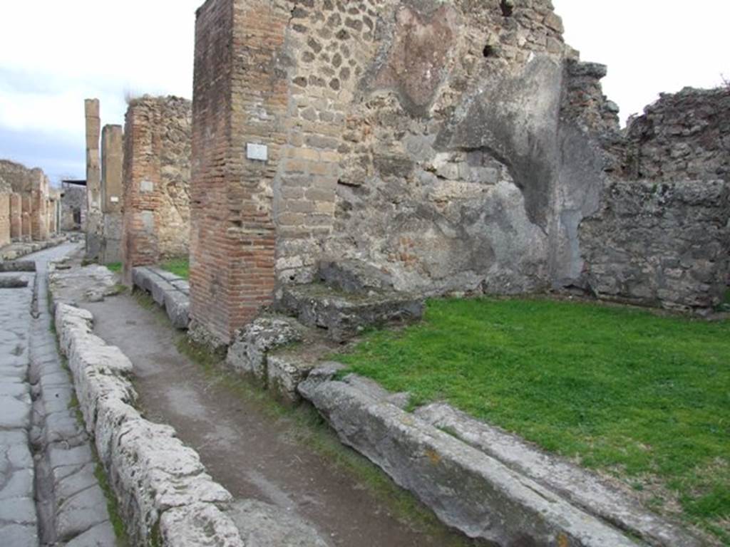 VII.12.4 Pompeii.  December 2007.  West wall and doorway in south wall to atrium of VII.12.3.