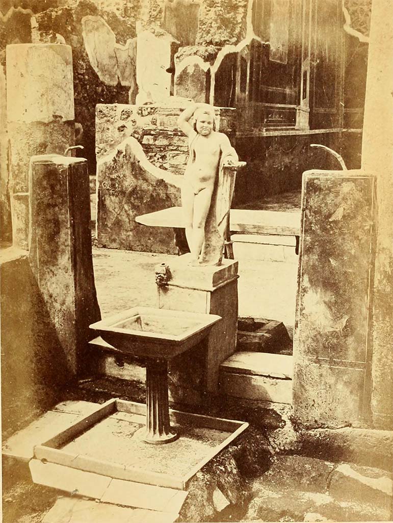 VII.12.28 Pompeii. 1867. Fountain and statue in Viridarium.
See Dyer, T., 1867. The Ruins of Pompeii. London: Bell and Daldy, p. 25.