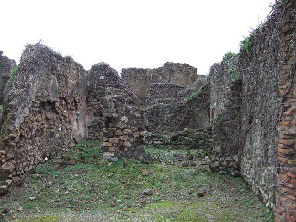 VII.12.34 Pompeii. December 2005. Looking east across bar-room. On the right at the rear was the doorway to the triclinium, on the rear left was a corridor leading to the latrine. On the extreme left, is a doorway linking to VII.12.35. According to Hobson, the siting of latrines is most often �off a narrow corridor�. In both VII.12.34 and 35, there would have been a great deal of privacy.
See Hobson, B., 2009. Latrinae et foricae: Toilets in the Roman World. London; Duckworth, (p.168)
