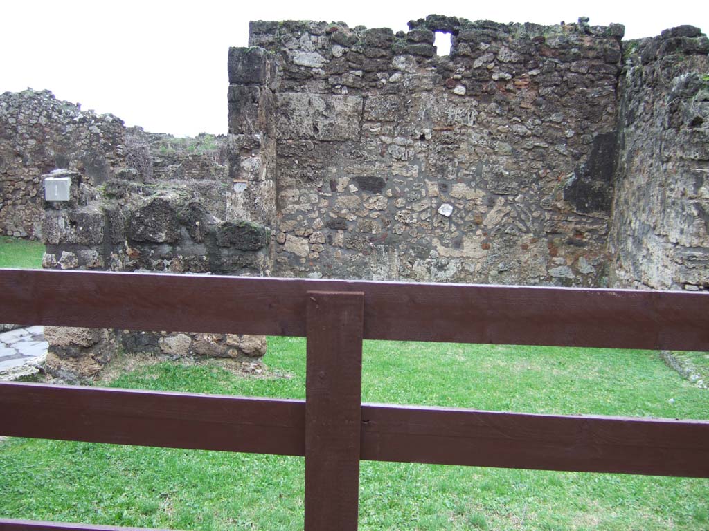 VII.12.37 Pompeii. December 2004. Looking south-west towards doorway, to the right from VII.12.1  