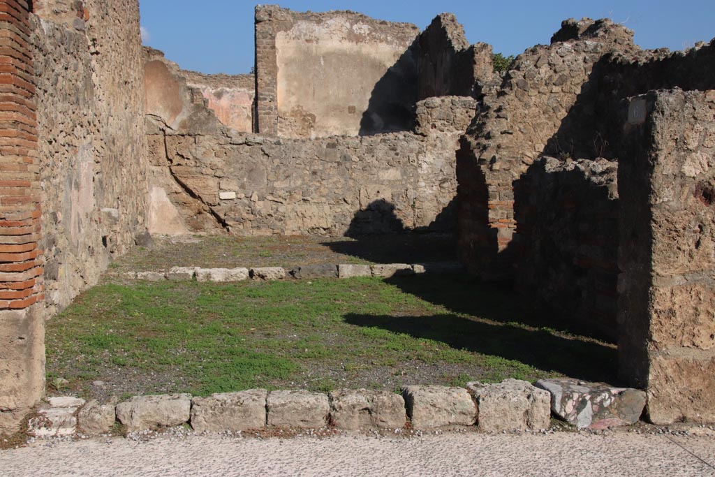 VII.14.6 Pompeii. December 2007. East wall with two doorways.