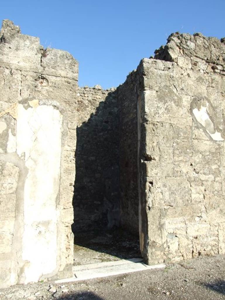 VII.15.2 Pompeii.  December 2007.  Door to Cubiculum on north east side of Atrium.