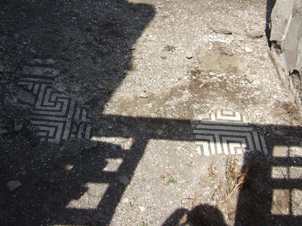 VII.15.2 Pompeii. September 2005. Doorways on west side of Atrium looking north.