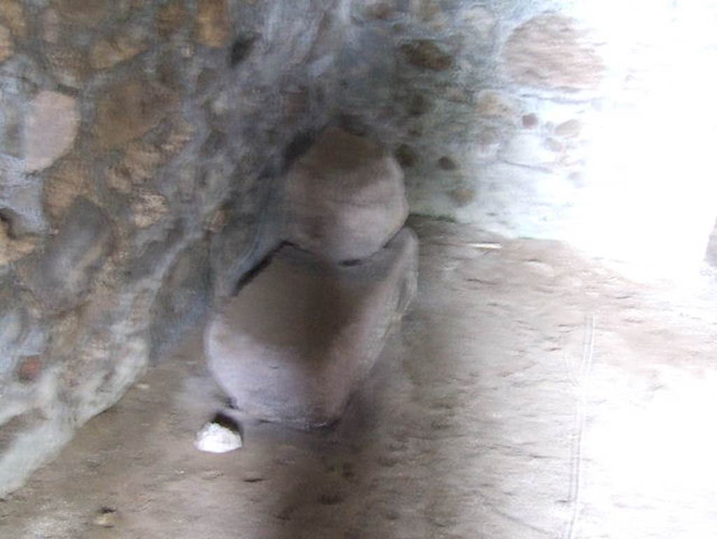 VII.15.16 Pompeii. May 2006. Granary. Room f, north-east corner, and wall to left of doorway to corridor A.