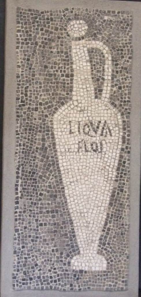 VII.16.15 Pompeii. Room 2, atrium from corner of Impluvium.
Mosaic showing Garum amphora with inscription
LIQUA(men) FLOS
SAP inventory number 15188.
See Aoyagi M. and Pappalardo U., 2006. Pompei (Regiones VI-VII) Insula Occidentalis. Napoli: Valtrend. (P. 511).