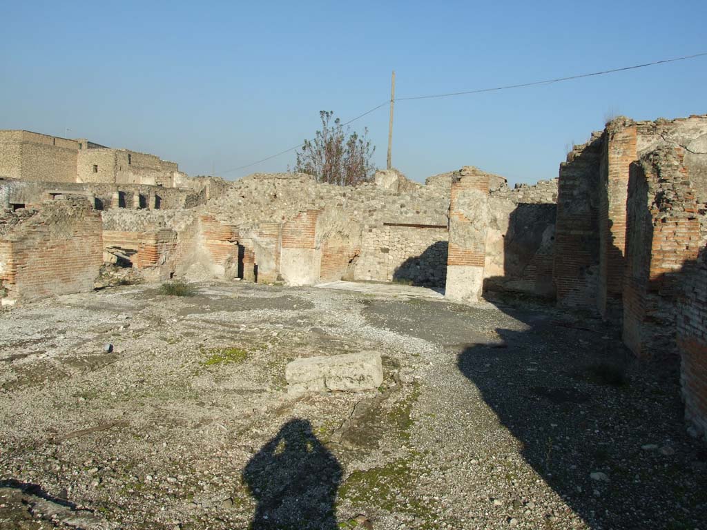 VII.16.15 Pompeii. December 2007. Room 2, looking north-east across site of impluvium in atrium.