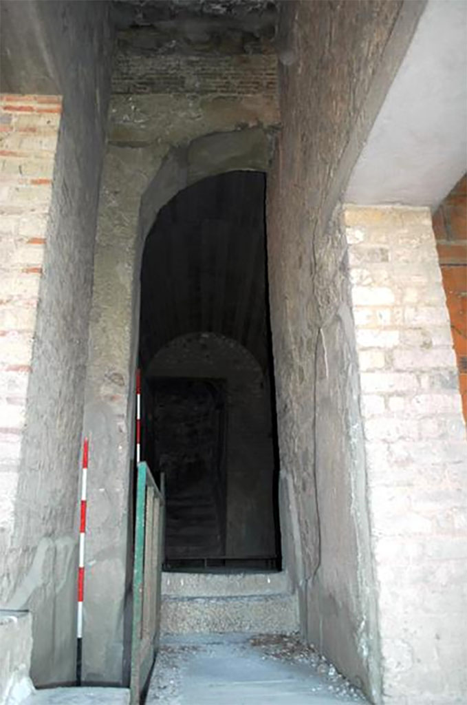 VII.16.17-22 Pompeii. 2014. Corridor 43, with steps ahead to corridor 42.
The doorway to yellow room 47 is on the right and to black room 44, on left.
This is the location of the Porta Occidentalis or Western Gate, originally with houses at each side but the house was built over it in Roman times.
Researchers at The University of Suor Orsola Benincasa discovered the presence of the Porta Occidentalis (posterula) with access to the city, aligned on an axis with via di Nola and Porta di Nola inside a contemporarily chronological arch ascribable to between III and II century BC. 
(translation:VII.16.17-22 Pompei. 2014. Corridoio con gradini avanti con porta alla camera gialla a destra e stanza nera a sinistra.
Questa � la posizione della Porta Occidentalis o Porta Occidentale, originariamente con case su ogni lato, ma la casa � stata costruita su di esso in epoca romana. I ricercatori dell'Universit� di Suor Orsola Benincasa hanno scoperto la presenza della Porta Occidentalis (posterula) con accesso alla citt�, allineata su un asse con via di Nola e Porta di Nola all�interno di un arco cronologico coevo ascrivibile tra III e II secolo a.C.)
Photograph � Parco Archeologico di Pompei.
