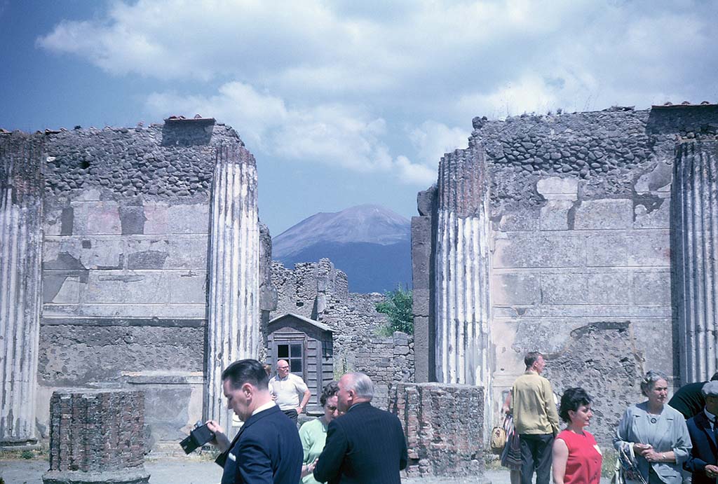 VIII.1.2 Pompeii. June 1962. Looking north to doorway from Basilica onto Via Marina. Photo courtesy of Rick Bauer.