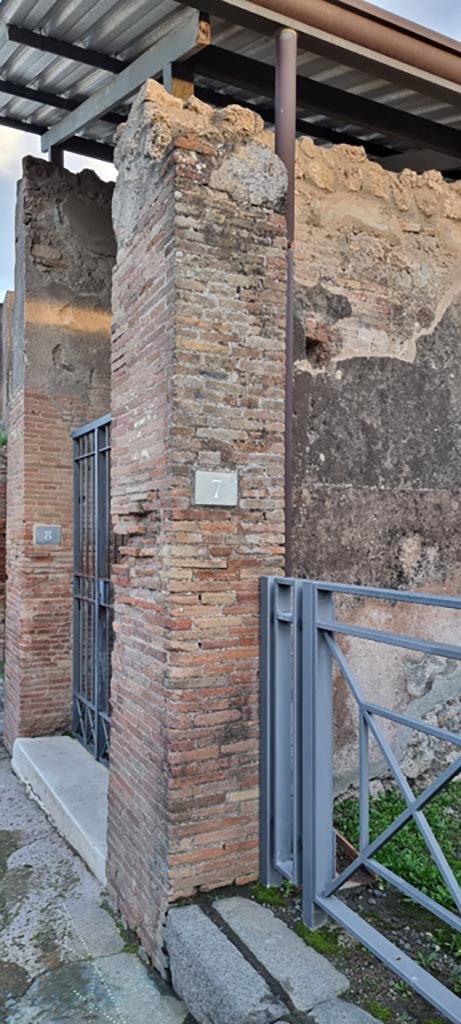 VIII.3.8/7 Pompeii. December 2023.
Pilaster on west (right) side of entrance doorway to VIII.3.8.
Photo courtesy of Miriam Colomer.