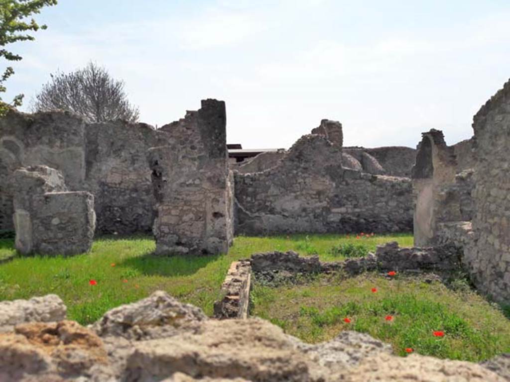 VIII.3.21 Pompeii. April 2017. Looking south across garden area (8), front right, with room 3 rear left.
Room 2 at the end of the entrance corridor is rear right in the photo.
Photo taken over wall from VIII.3.24.
Photo courtesy of Dr Paul J. Turner.