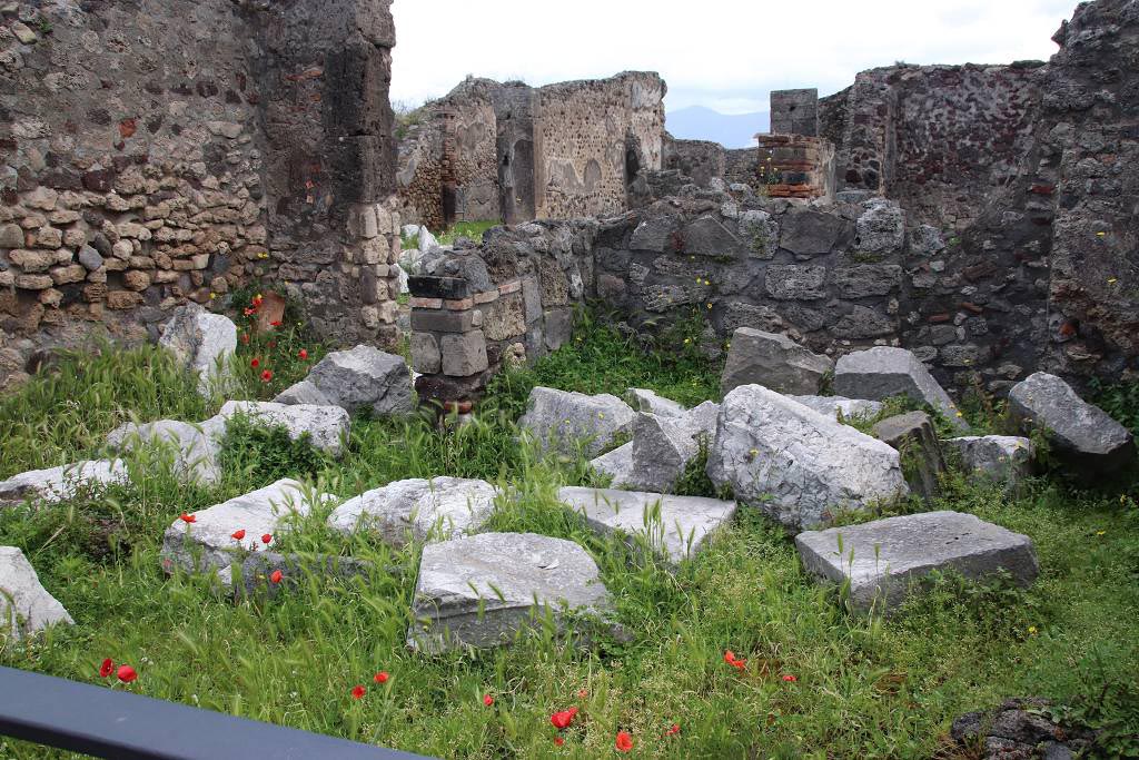 VIII.3.30 Pompeii. May 2024. Looking east from entrance doorway towards area of stairs to upper floor.
The stairs would have been enclosed in a small room, at its rear would have been a small room, with a doorway to a room (on left) with a doorway at its east end into the atrium of VIII.3.31. Photo courtesy of Klaus Heese.
