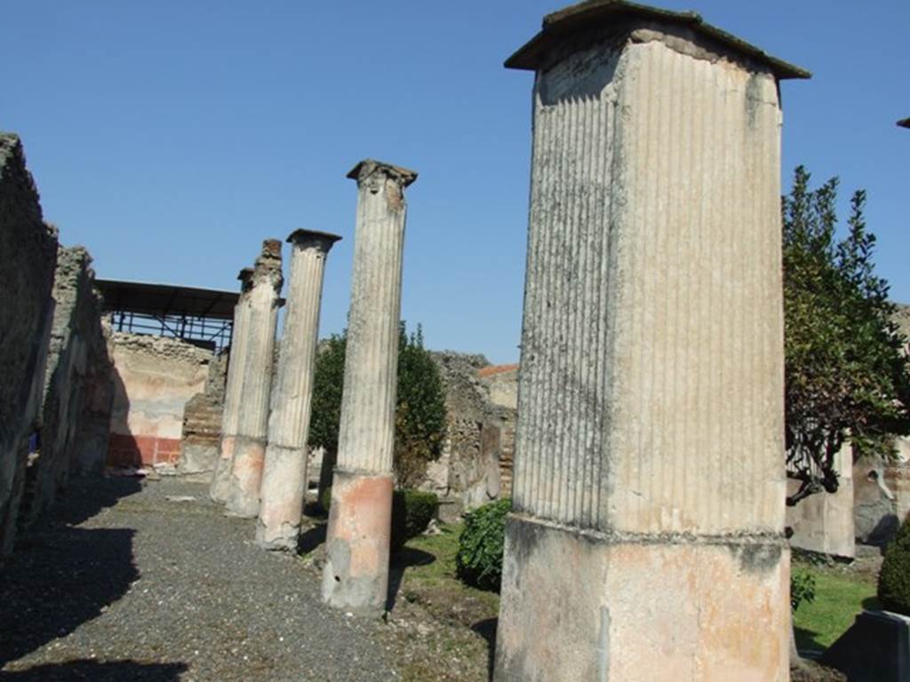 VIII.4.4 Pompeii. March 2009. Area 13, looking north along west portico.
Among the graffiti found, was one on the right wall in the peristyle.
This was either for the purchase or perhaps the sale on a certain day in July of an unspecified year of 200 pounds of hog’s lard and 250 bunches of garlic.  
IIX .  ID  IVLIAS  AXVNGIA  P . CC 
ALIV . MANVPLOS  CCL         [CIL IV 2070]
See Pappalardo, U., 2001. La Descrizione di Pompei per Giuseppe Fiorelli (1875). Napoli: Massa Editore. (p.127)
See Jashemski, W. F., 1993. The Gardens of Pompeii, Volume II: Appendices. New York: Caratzas. (p.212)
