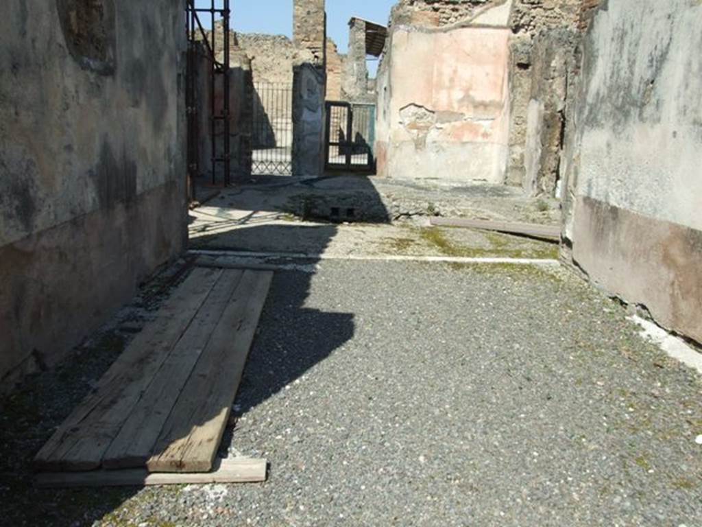 VIII.4.4 Pompeii. March 2009. Room 20, looking north through tablinum to atrium and front entrance. According to Fiorelli, when excavated only one painting remained, showing Venus and Adonis sitting and looking at a nest of three cupids. He said they had also found a fragment of the other painting that had a sitting Endymion.  See Pappalardo, U., 2001. La Descrizione di Pompei per Giuseppe Fiorelli (1875). Napoli: Massa Editore. (p.126) According to the Giornale di Scavi 1861, see page 42: In the tablinum ��..  is shown Leda showing Tindarus the twins and Helen just come out of the egg.
