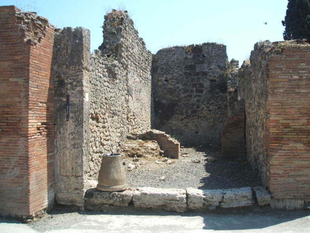 VIII.4.11 Pompeii. May 2005. Entrance. According to Della Corte this shop and the annexed modest dwelling was held by an unknown Pigmentarius.
Many colouring materials and also of a considerable quantity of bitumen was found. See Della Corte, M., 1965. Case ed Abitanti di Pompei. Napoli: Fausto Fiorentino. (p.237)