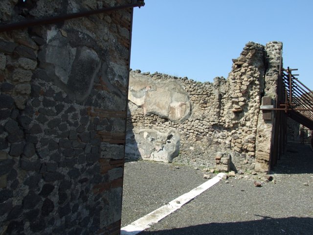 VIII.4.15 Pompeii. March 2009. Room 17, exedra. South wall, with door linking to VIII.4.30.