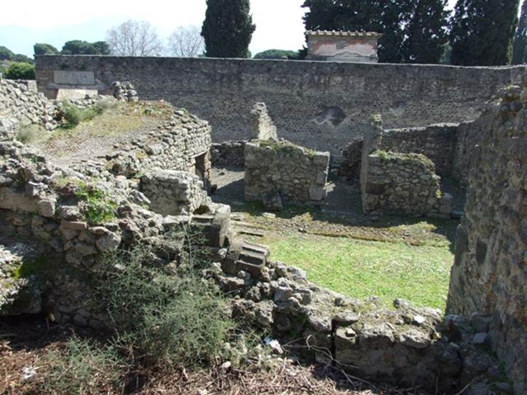 VIII.4.15 Pompeii. March 2009. Looking south to lower level and VIII.4.30, through doorway in south wall of room 17. 