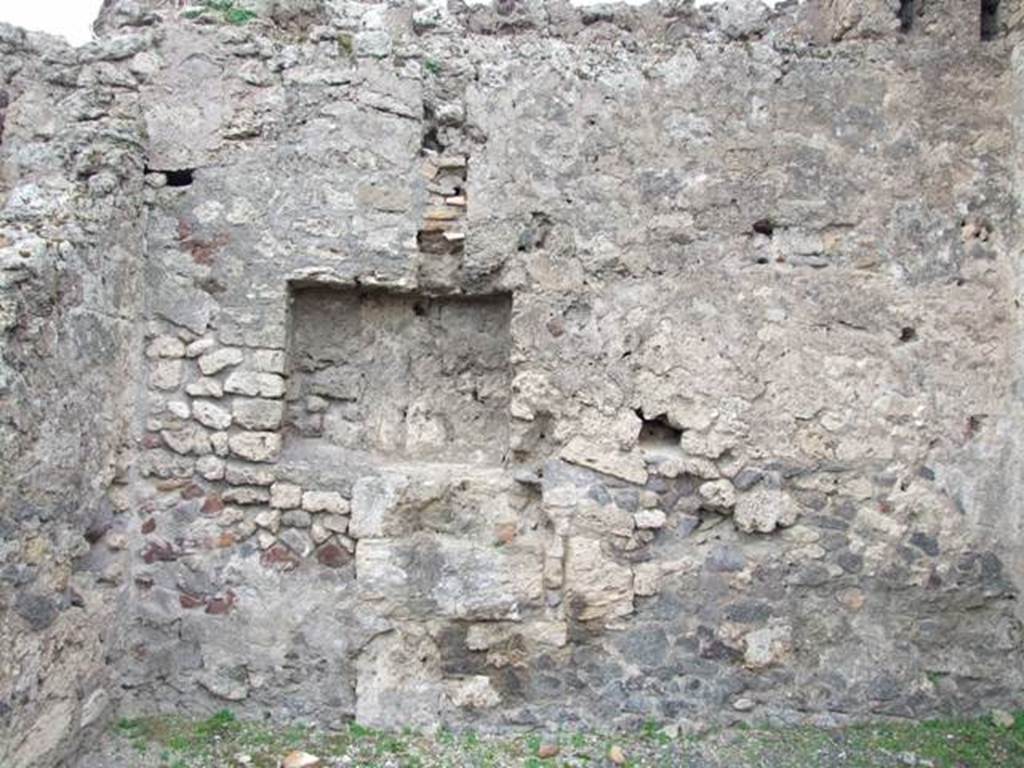 VIII.4.21 Pompeii. Shop and rooms. December 2007. Niche or cupboard in west wall of rear room.