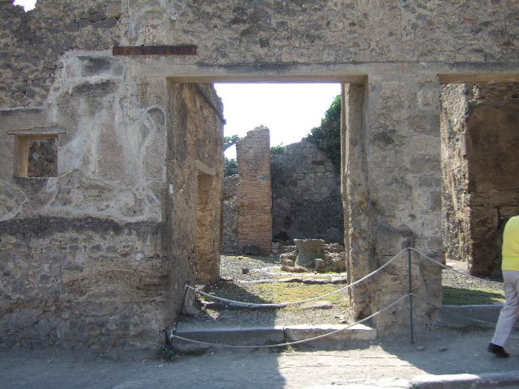 VIII.4.27 Pompeii.  September 2005. The following inscriptions, painted in red and black were found in March 1853 on the fa�ade: 

Gavium Holconium II vir(um)
[�]iuvenes probos o(ro) v(os) f(aciatis)  [CIL IV 1007] 

[Pos]tumium aed(ilem)
Felix rog(at)  [CIL IV 1008]

Ceium II vir(um) i(ure) d(icundo) o(ro) v(os) f(aciatis)  [CIL IV 1009]

[Hol]conium Priscum II vir(um) i(ure) d(icundo)  [CIL IV 1010]

Cuspium Pansam aed(ilem)
Popidius Natalis cliens cum Isiacis rog(at)  [CIL IV 1011]

Popidium Secundum
egregium adulescentem aed(ilem) o(ro) v(os) f(aciatis)  [CIL IV 1012]

See Pagano, M. and Prisciandaro, R., 2006. Studio sulle provenienze degli oggetti rinvenuti negli scavi borbonici del regno di Napoli. Naples : Nicola Longobardi. (p.167) 
