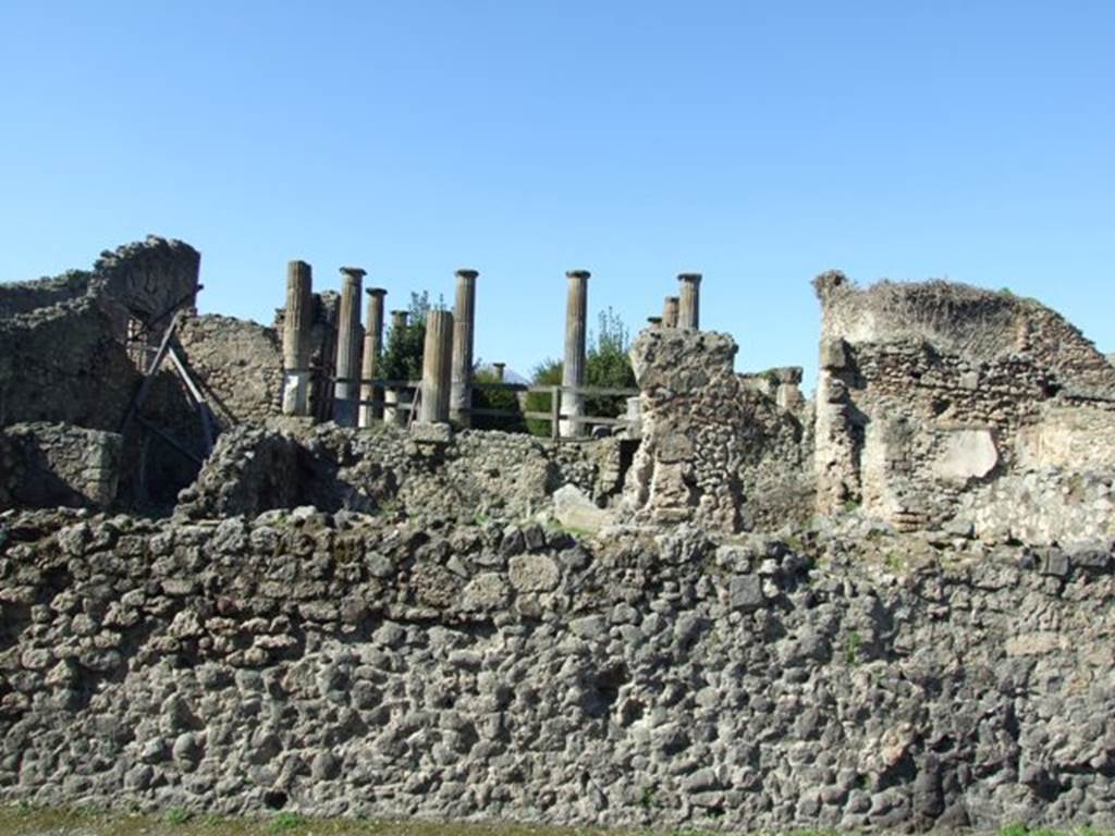VIII.4.29 Pompeii. March 2009. Looking north from Via del Tempio d’Iside, across remains of peristyle area, behind wall. According to Boyce, in this peristyle high up on the north wall was an arched niche.
See Boyce G. K., 1937. Corpus of the Lararia of Pompeii. Rome: MAAR 14. (p.76)