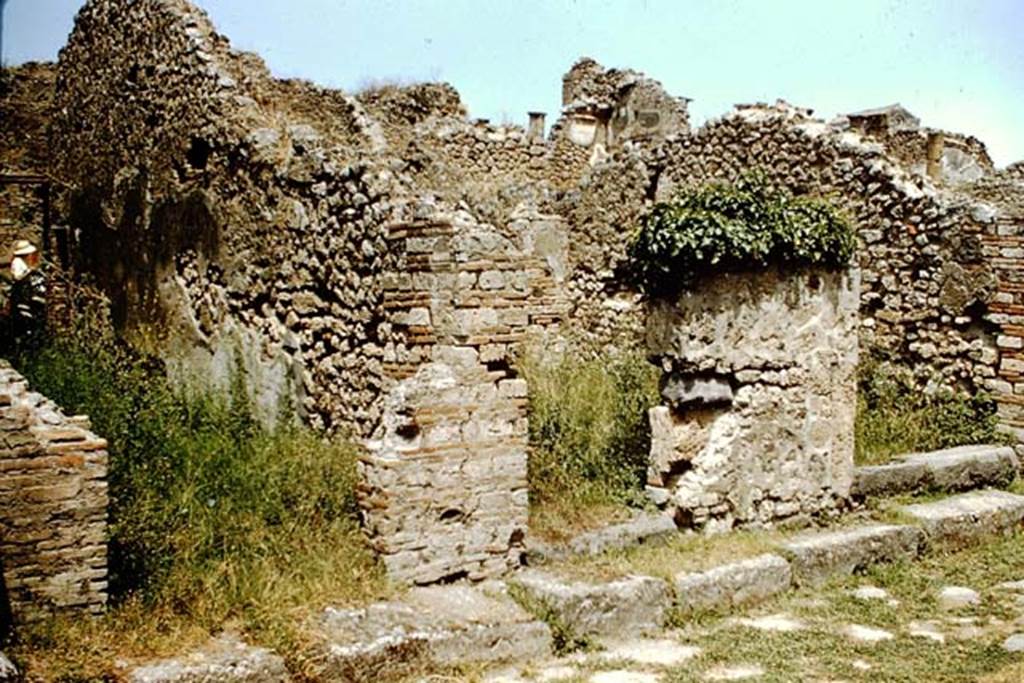 VIII.4.33 Pompeii on left, VIII.4.32 and VIII.4.31 on right. 1959.
Looking towards entrance doorways on Via del Tempio d’Iside. Photo by Stanley A. Jashemski.
Source: The Wilhelmina and Stanley A. Jashemski archive in the University of Maryland Library, Special Collections (See collection page) and made available under the Creative Commons Attribution-Non Commercial License v.4. See Licence and use details.
J59f0269