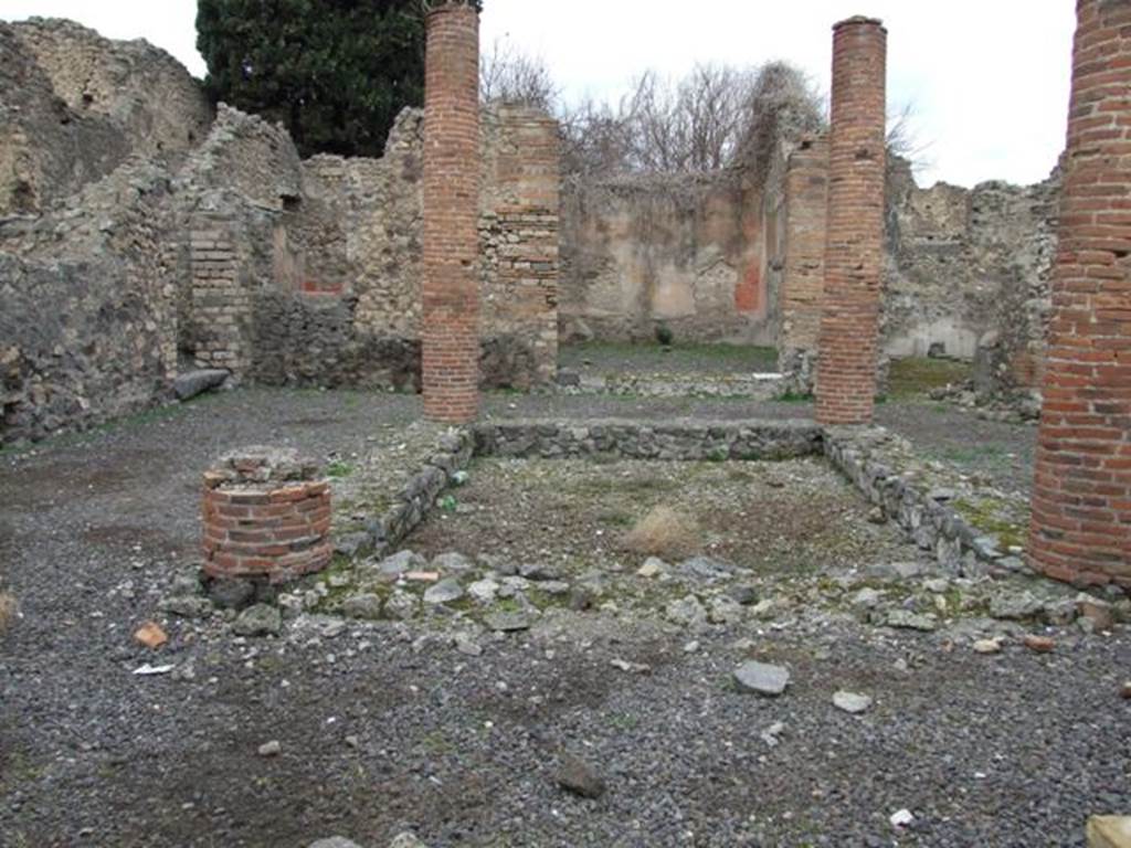 VIII.4.34 Pompeii. December 2007. Looking north across tetrastyle atrium. The tablinum is at the rear. According to Breton, in the tablinum were two well preserved wall paintings, to the right Hercules and Omphale, to the left an unidentified subject. Helbig agreed.
See Breton, Ernest. 1870. Pompeia, Guide de visite a Pompei, 3rd ed. Paris, Guerin. 
See Helbig, W., 1868. Wandgem�lde der vom Vesuv versch�tteten St�dte Campaniens. Leipzig: Breitkopf und H�rtel. (1136 and 971)

